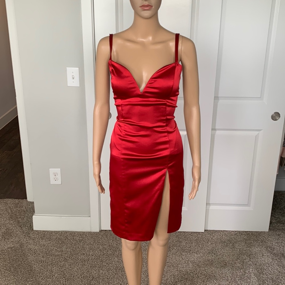 Red BEBE satin strappy dress with a thigh high slit